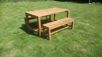  Home made hard wood table and benches. Made to order for a customer. 