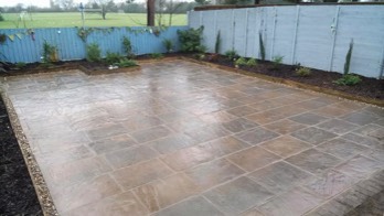  Raised beds. With stone border and patio. 